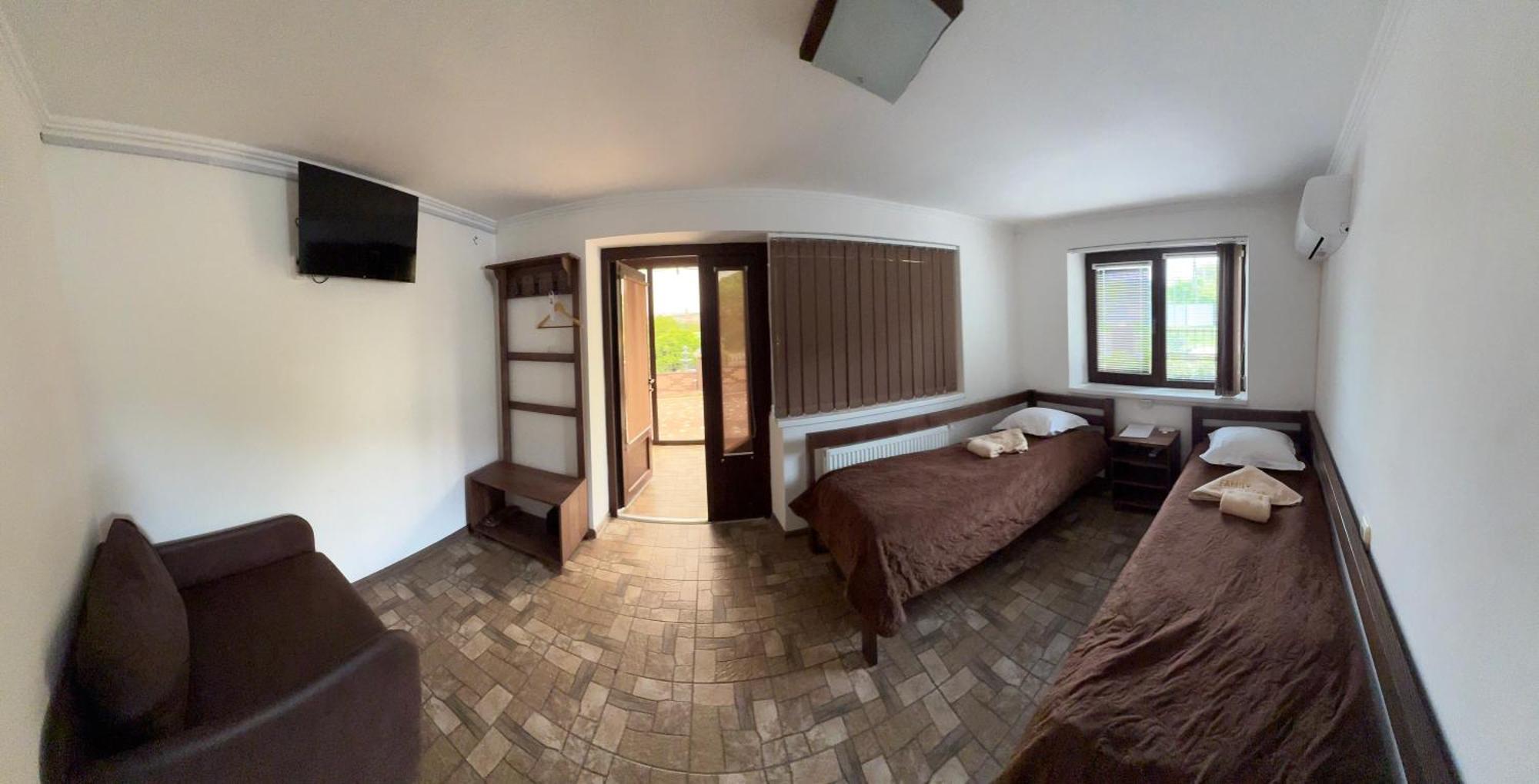 Family Люкс Aparthotel คาเมียเนตส์-โปดิลสกี ภายนอก รูปภาพ